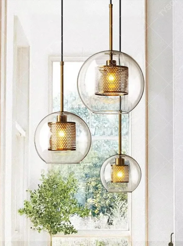 Modern light luxury golden mesh shade glass ball chandelier (multi-size combination), warm light effect, creating an exquisite layered minimalist space atmosphere.