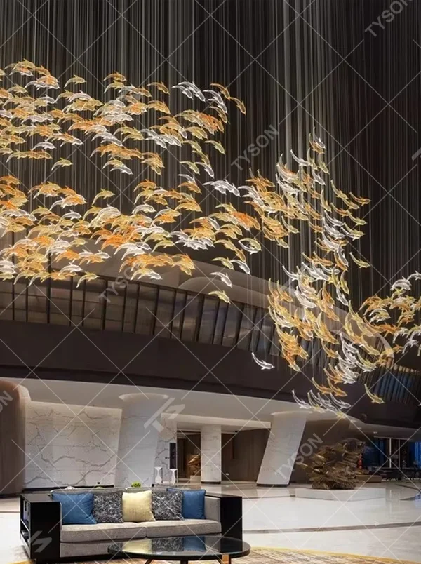 Art bird-shaped chandelier (gold-white gradient birds + warm light), warm light effect, creating a dynamic and natural atmosphere for high-end public spaces.