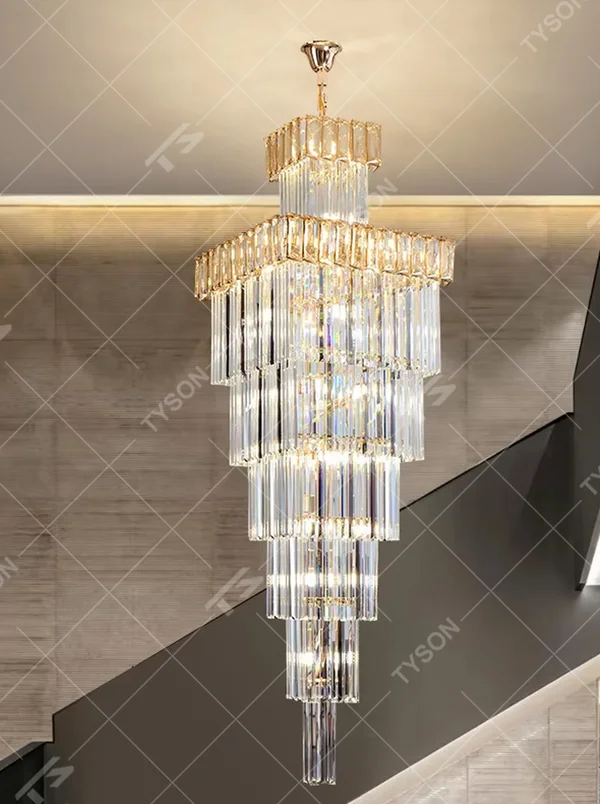 Modern light luxury multi-layer square tower-shaped golden frame crystal chandelier, warm light effect, creating an exquisite and luxurious modern space atmosphere.