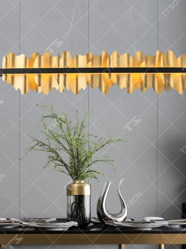 Modern art mountain-shaped black-gold long chandelier, warm light effect, creating a high-quality creative space atmosphere.