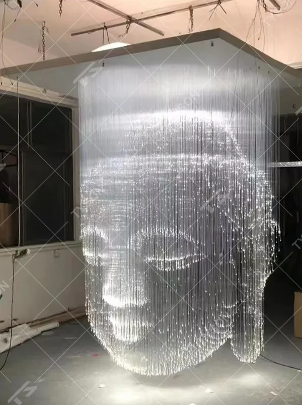 Art portrait light thread chandelier (light thread array + portrait shape), warm light effect, creating a shocking artistic space atmosphere.