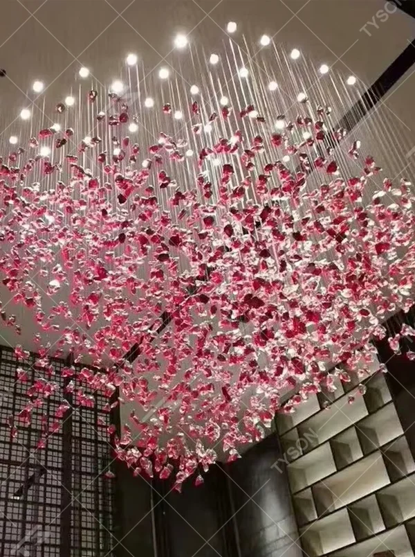 Art pink crystal cluster chandelier (hanging crystals + warm light), warm light effect, creating a romantic and brilliant atmosphere for high-end public spaces.