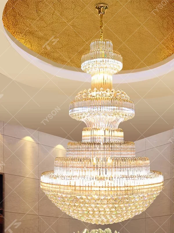 Top-luxury golden multi-layer crystal tower-shaped chandelier, warm light effect, creating a magnificent and luxurious royal-level space atmosphere.