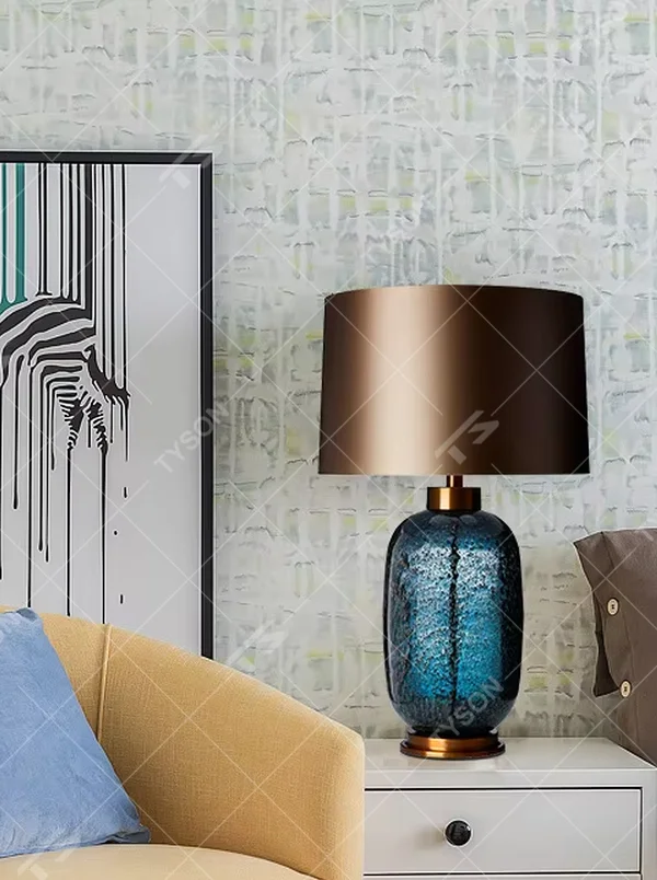 Light luxury cracked blue glaze table lamp (blue glaze body + gradient fabric shade + gold accessories), warm light effect, creating an elegant and high-end home atmosphere.