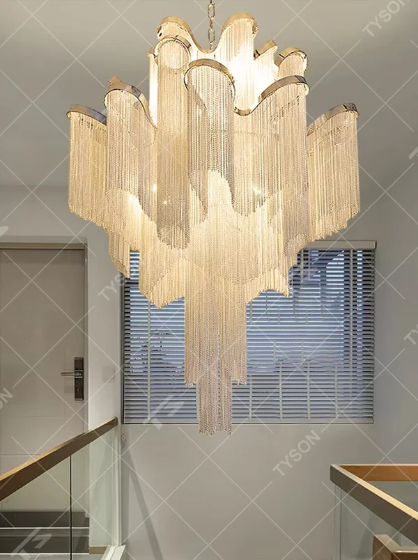 Light luxury waterfall crystal chain chandelier (warm light), warm light effect, creating a luxurious and soft high-end space atmosphere.