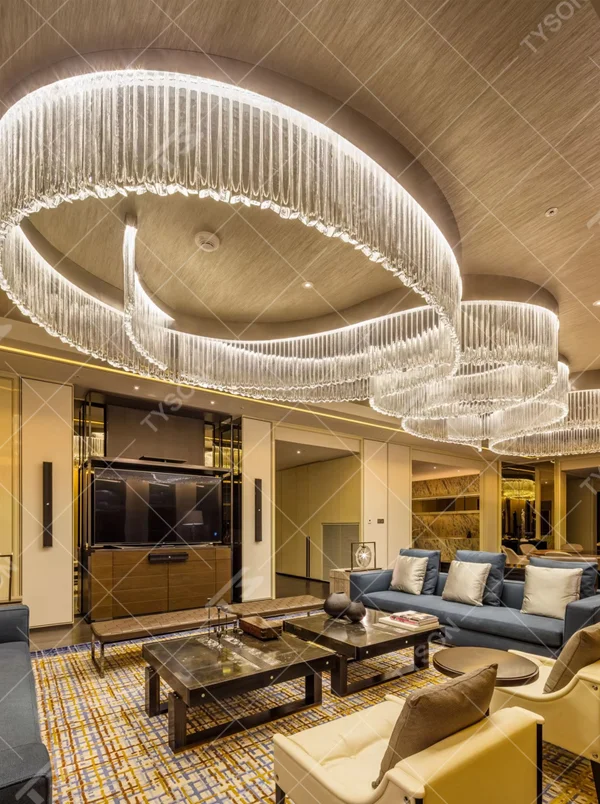 Light luxury ring gradient crystal strip engineering chandelier, transparent crystal strips hanging to create a multi-layer nested ring shape, with transparent and brilliant light, designed to enhance the luxurious atmosphere of high-end spaces, suitable for high-ceiling engineering scenarios such as hotel lobbies, club reception halls, and high-end showrooms