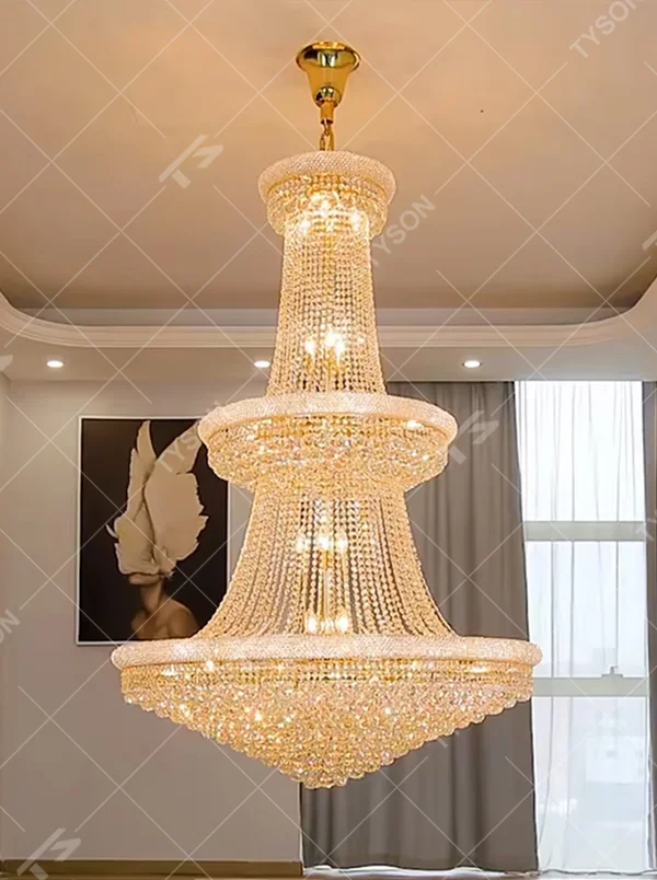 Multi-tiered tower-shaped golden crystal chandelier, with multi-layer dense crystal pendants and gold metal frames, providing brilliant and luxurious light, designed to create a high-end and grand space atmosphere, suitable for high-ceiling engineering scenarios such as villa high-ceiling living rooms, duplex buildings, hotel lobbies, and clubs