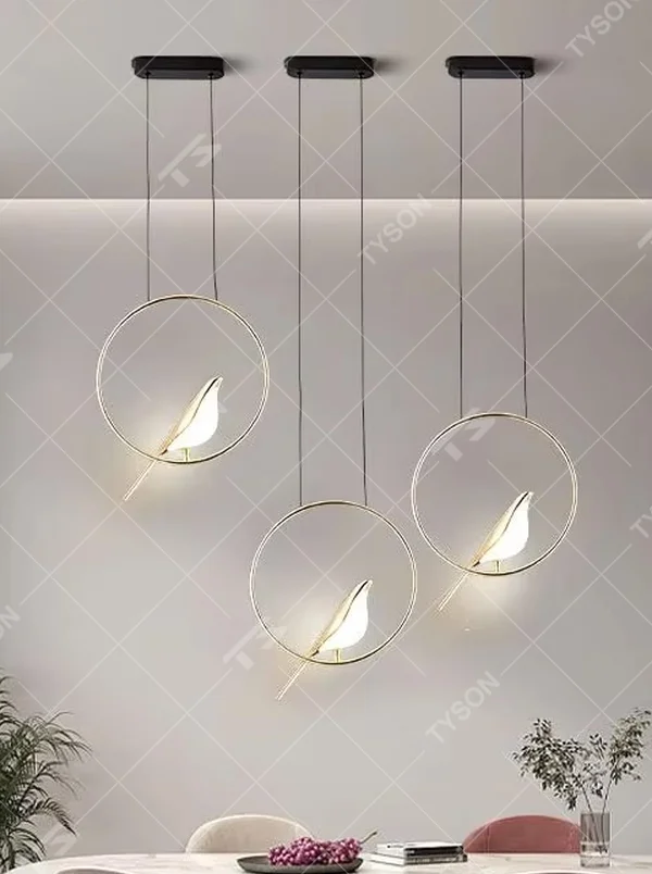 This modern minimalist chandelier features a black metal oval frame, paired with a beveled gold decorative piece and soft LED light source. It has a minimalist and design-conscious shape, serving both lighting and decorative purposes, ideal for modern minimalist spaces such as bedroom bedside tables, living room side tables, and hotel guest rooms.