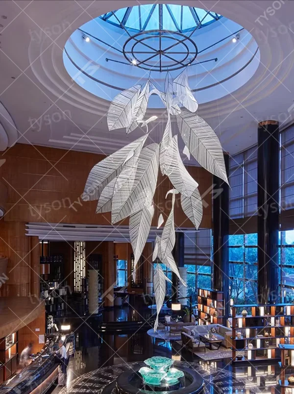 Inspired by "natural leaf veins", this chandelier features layered leaf structures made of translucent acrylic/crystal material, with delicate textures like real veins. The pendant layout mimics the natural drooping form of leaves, and light refracts soft and warm light and shadow through the material. It is both a space lighting tool and a visually striking art installation, infusing high-end venues with a natural and elegant artistic style.