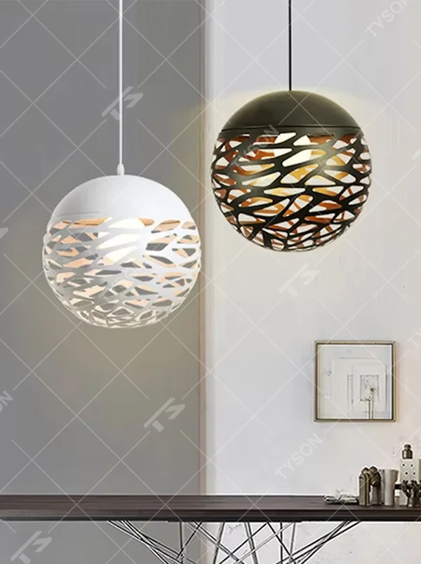 This minimalist hollow spherical chandelier features irregular hollow textures made of metal, available in black and white color options. It emits soft diffused light when lit, serving both lighting and decorative purposes, ideal for dining rooms, living rooms, modern homes and other scenarios.
