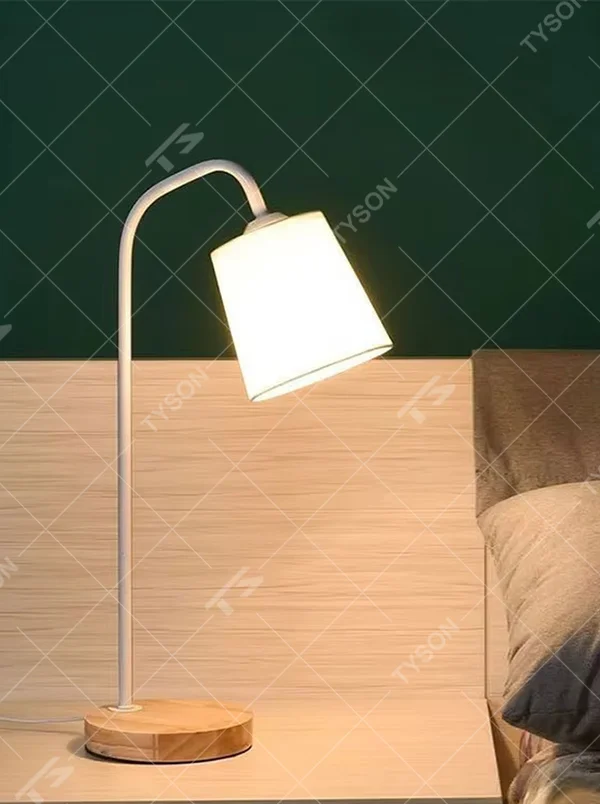 Nordic minimalist eye-protection table lamp, solid wood base paired with white bendable iron lamp pole and fabric lampshade, soft and eye-protective light, used for lighting in desks, nightstands and other areas, suitable for Nordic-style homes, office areas, homestay guest rooms, etc.