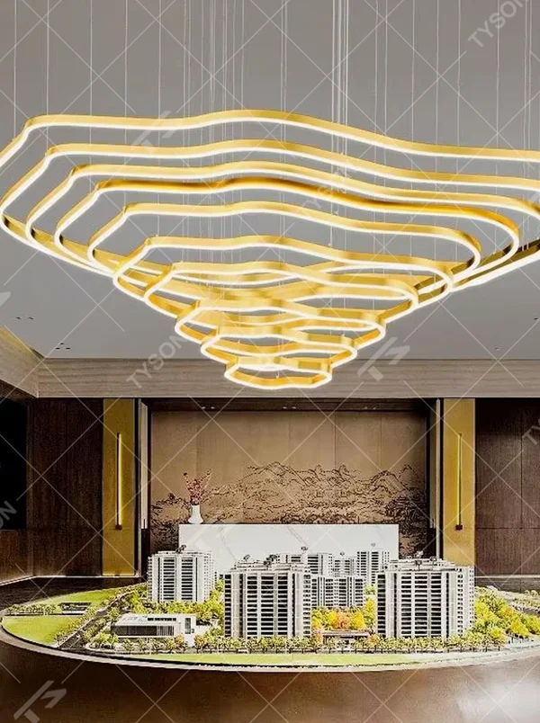 This new Chinese style light luxury large chandelier features multi-layer wavy LED light strips made of gold metal, in a stacked suspended cloud/mountain shape. It serves both lighting and decorative purposes, ideal for high-end spaces such as sales offices, hotel lobbies, and villa high-ceiling living rooms.