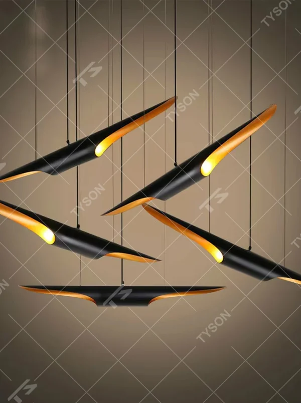 This modern minimalist wing-shaped chandelier features a black metal body with warm light LED strips embedded in the edges, hung in a scattered bird-like shape. It serves both lighting and decorative purposes, ideal for high-ceiling living rooms, light luxury restaurants, high-end office spaces and other scenarios.