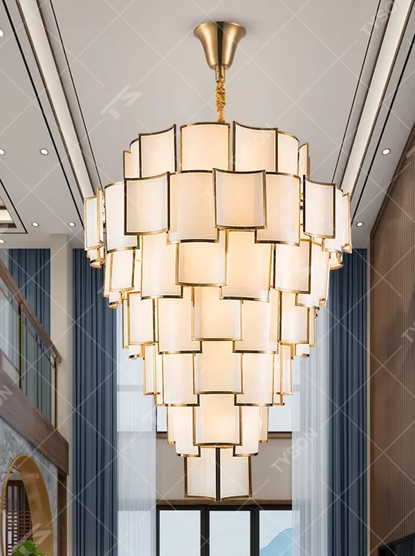 This new Chinese style light luxury large chandelier features a gold metal frame, paired with multi-layer off-white fabric lampshades, in a stacked cone shape. It serves both lighting and decorative purposes, ideal for high-end high-ceiling spaces such as villa high-ceiling living rooms, hotel lobbies, and sales offices.