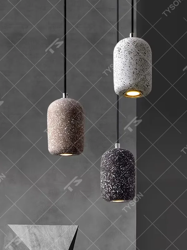 Modern industrial style terrazzo texture single-head chandelier, available in three colors (white, brown, black), with a cylindrical particle-textured lamp body that emits soft, focused light. It combines decorativeness and practicality, suitable for ambient and supplementary lighting in restaurant bars, bedroom nightstands, industrial-style shops, etc.