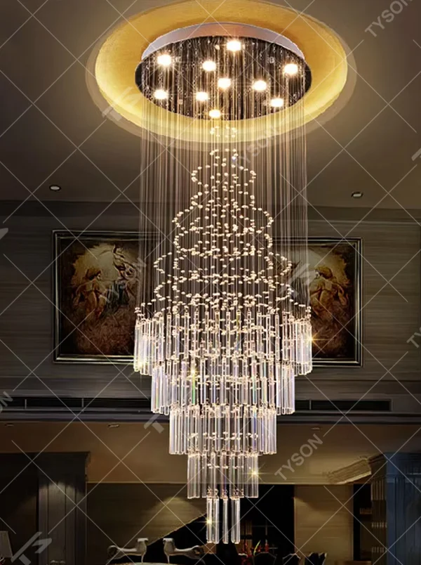 European luxury waterfall-style crystal chandelier, composed of multi-layer crystal columns and particles in a cascading structure, paired with a silver metal frame. It emits brilliant and transparent light, combining artistic decorativeness and lighting function, suitable for core lighting and atmosphere creation in high-ceiling spaces such as villa high-ceiling living rooms, hotel lobbies, and high-end clubs.