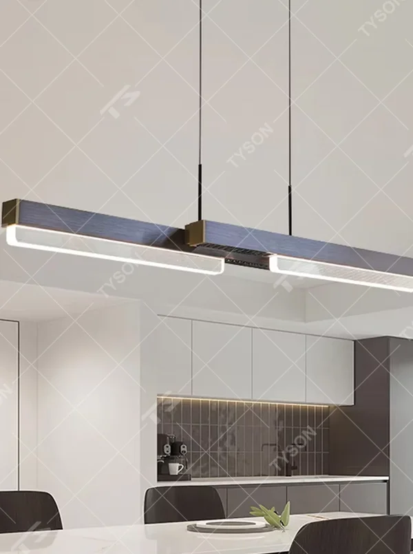This is a modern minimalist style linear chandelier, featuring a walnut texture panel paired with brass metal accents. The linear lighting design emits soft and uniform light, serving both practical lighting and space decoration purposes, suitable for dining rooms, open kitchens, light luxury bars, modern office areas and other scenarios.