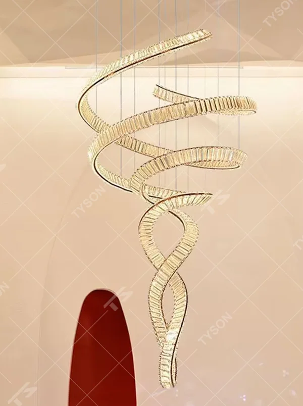 This is a light luxury artistic streamlined chandelier, featuring a dynamic spiral twisted shape crafted from gold light-emitting strips, as rhythmic as flowing ribbons, serving both lighting and artistic decoration purposes, suitable for high-ceiling spaces such as villa high-ceiling living rooms, duplex voids, hotel lobbies, and spiral staircases.