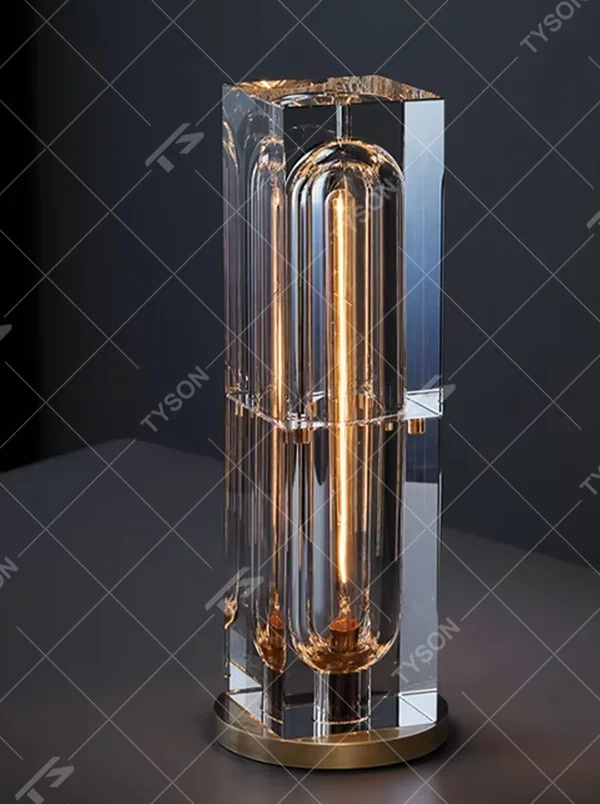 Modern light luxury cut crystal column table lamp, with a transparent multi-faceted cut crystal lamp body paired with a gold metal base, emitting soft and transparent light, combining decorativeness and practicality, suitable for lighting and decoration in spaces such as bedroom nightstands, living room side tables, and hotel guest rooms.