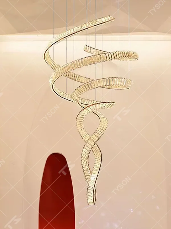 Modern art streamlined crystal chandelier, composed of multiple groups of spirally wrapped crystal strips forming a vivid ribbon shape, emitting brilliant and transparent light, combining artistic decorativeness and lighting function, suitable for core decoration and main lighting in high-ceiling spaces such as duplex stairs, villa hollow areas, and high-end clubs.