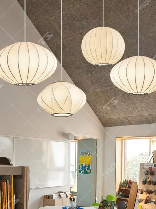 This is a set of modern minimalist multi-shaped pleated fabric chandeliers, composed of off-white pleated lampshades in different shapes such as ellipse, flying saucer and flower bud, which has both soft lighting and artistic decoration functions, suitable for living rooms, dining rooms, B&Bs, cafes and other spaces.