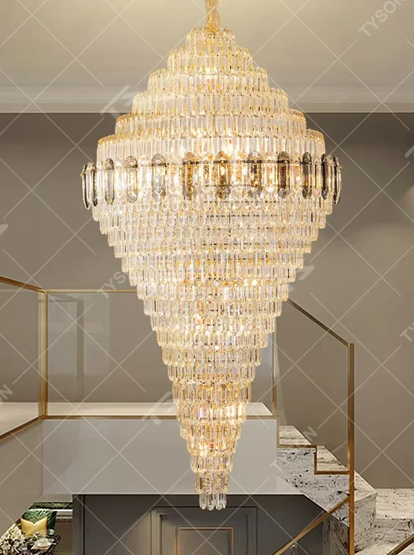 This is an European-style luxurious teardrop-shaped crystal chandelier, featuring a pyramid shape crafted from multi-layer dense crystal strips, emitting brilliant and gorgeous light, serving both lighting and decorative purposes, suitable for villa high-ceiling living rooms, hotel lobbies, banquet halls, high-end clubs and other scenarios.
