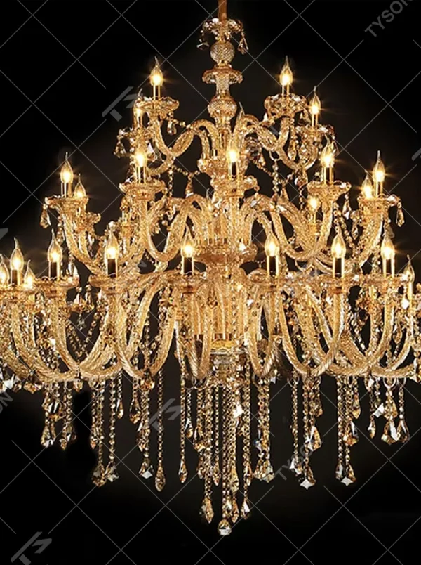 European palace-style luxury multi-layer crystal chandelier, featuring a gold-plated metal frame paired with transparent crystal pendants and candlestick-shaped lamp heads. It emits brilliant and dazzling light, combining artistic decorativeness and lighting function, suitable for core decoration and main lighting in large high-end spaces such as villa living rooms, hotel lobbies, and banquet halls.