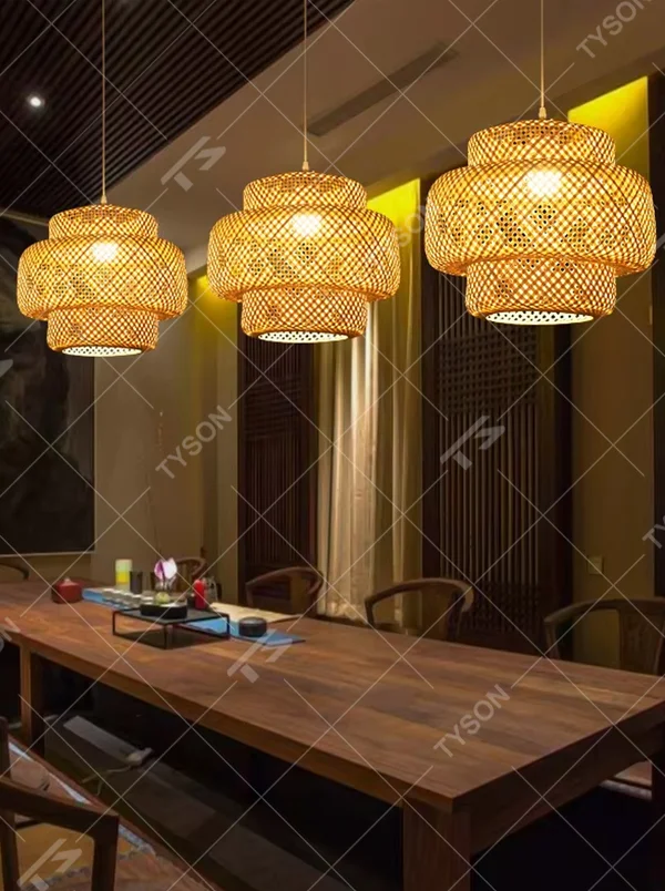 This new Chinese-style multi-layer bamboo woven lantern chandelier is made of natural bamboo strips woven into a hollow layered shape. Warm light refracts a soft halo through the bamboo texture, serving both lighting and decorative purposes, suitable for natural-style spaces such as tea rooms and restaurants.