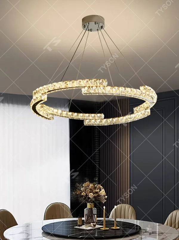 This light luxury irregular multi-layer ring crystal chandelier features a metal frame inlaid with high-transparency crystals, forming staggered ring structures, with brilliant and soft light, serving both lighting and decorative purposes, suitable for modern light luxury spaces such as living rooms and dining rooms.
