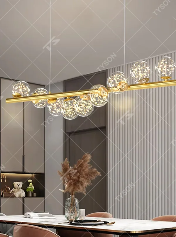 Modern Light Luxury Linear Bubble Ball Chandelier, Gold Metal Base with Transparent Starry Sky Glass Ball Shades, Serves Both Lighting and Decorative Purposes, Ideal for Dining Rooms, Bars, Open Kitchens, etc.