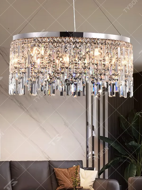 This light luxury tassel crystal chandelier features a circular tassel shape made of a metal frame and multi-layer faceted crystal strips, with light refracting a brilliant halo through the crystals, serving both lighting and decorative purposes, suitable for modern light luxury spaces such as living rooms and dining rooms.