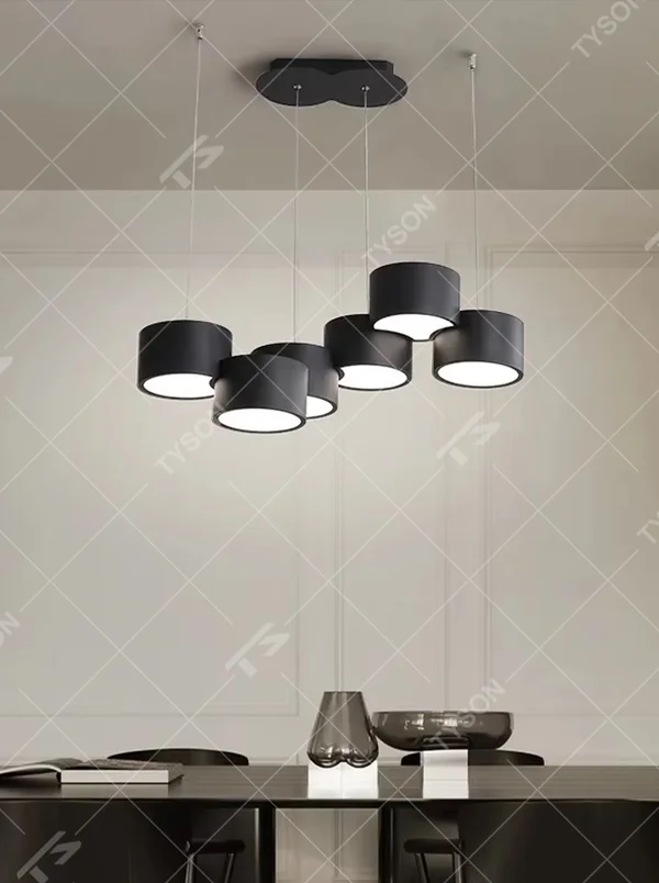 A modern minimalist multi-head cylindrical chandelier, featuring a white metal housing with a staggered stacked layout, built-in LED light source. It emits soft and uniform warm light when lit, combining decorative appeal with practical illumination, ideal for creating a minimalist and fresh space atmosphere.