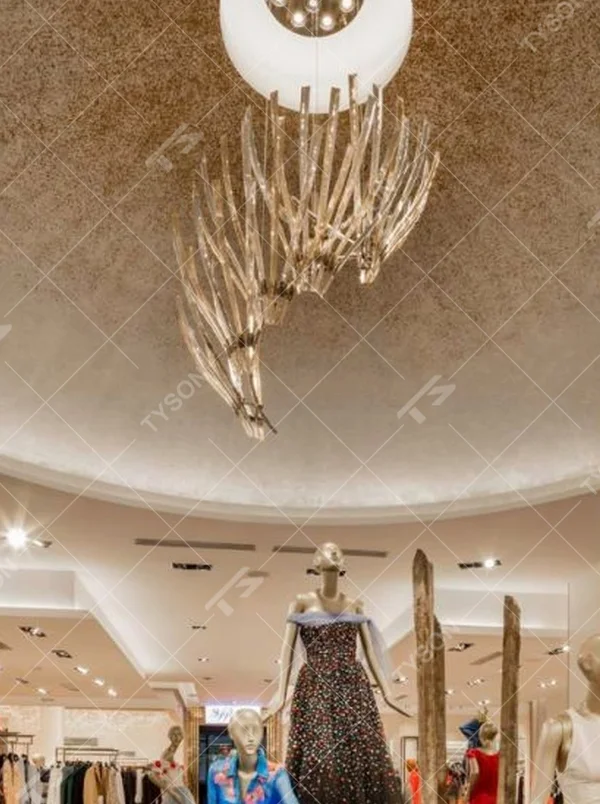 This light luxury art branch chandelier features a bionic branch shape made of metal, paired with transparent crystal strips, with light refracting a soft halo through it, serving both lighting and decorative purposes, suitable for high-end clothing stores, exhibition halls and other commercial spaces.