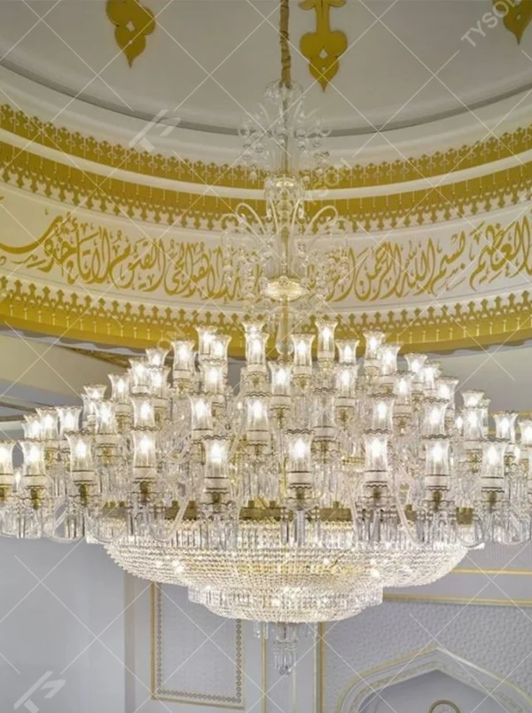 This Islamic-style large multi-layer crystal chandelier features a luxurious shape made of a gold metal frame and faceted crystals, with light refracting a brilliant halo through the crystals, serving both lighting and decorative purposes, suitable for luxurious religious or commercial spaces such as mosques and high-end hotel lobbies.