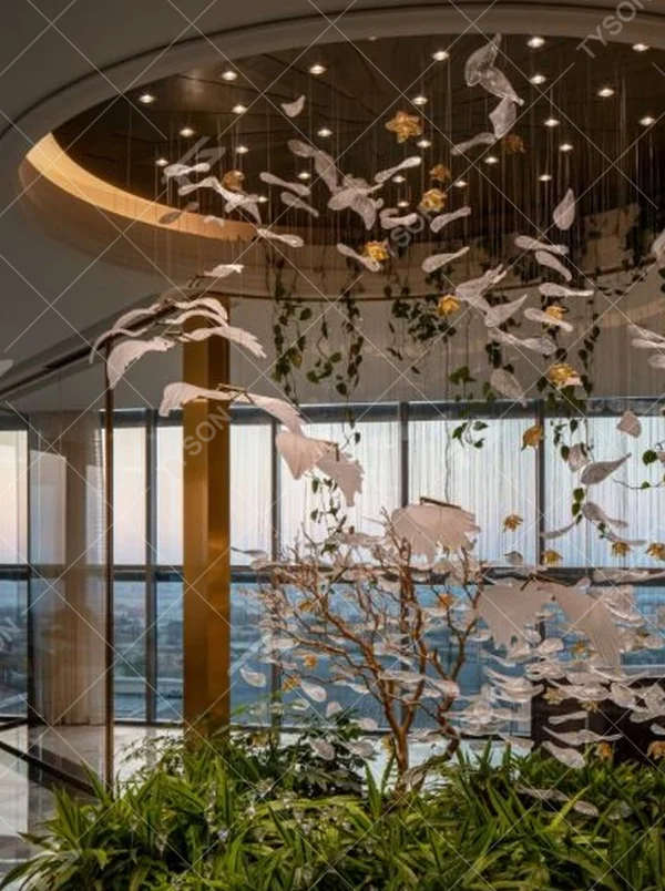 This is a natural-style suspended art installation lamp, composed of transparent ripple-shaped leaves and gold accents, creating an immersive scene with dead trees and green plants, with both decorative and lighting functions, ideal for weddings, high-end restaurants, art galleries and other scenarios.