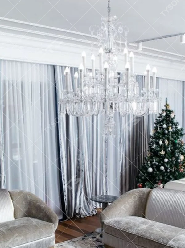 This is a European court-style large chandelier, composed of densely packed transparent crystal pendants and candle-style lamp arms, brilliant and luxurious, with both decorative and lighting functions, ideal for high-end indoor spaces such as villa living rooms and banquet halls.