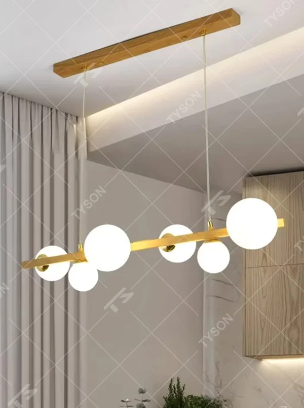Nordic style wood-metal combined linear molecular ball chandelier, with a wood-grain and golden metal frame paired with staggered milky white glass ball lampshades, featuring soft and uniform light, combining decorative and lighting functions, suitable for dining rooms, bars, open kitchens and other modern style spaces.
