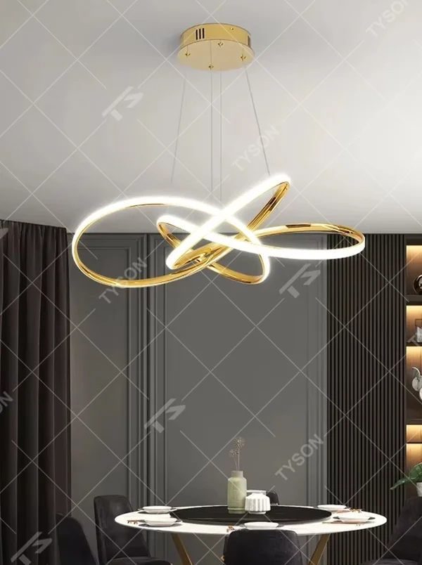 A modern light luxury style interwoven ring LED chandelier, featuring a smooth interwoven multi-ring frame made of gold metal, with built-in high-brightness LED strips. It emits soft and uniform warm light when lit, combining decorative appeal with practical illumination, ideal for creating a minimalist and sophisticated space atmosphere.