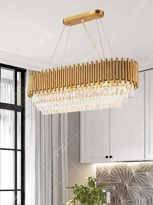 This light luxury double-layer oval chandelier consists of upper gold metal vertical strips and lower faceted crystal pendants. Light refracts through the crystals to emit a brilliant glow, serving both lighting and decorative purposes, suitable for high-end spaces such as villa living rooms and light luxury dining rooms.
