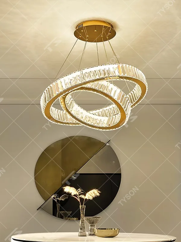 This is a luxurious large chandelier, supported by a gold metal frame with multi-layer crystal pendants, featuring a blooming and gorgeous shape, with brilliant and dazzling light, both decorative and lighting functions, ideal for large commercial spaces such as high-end restaurants and hotel lobbies.