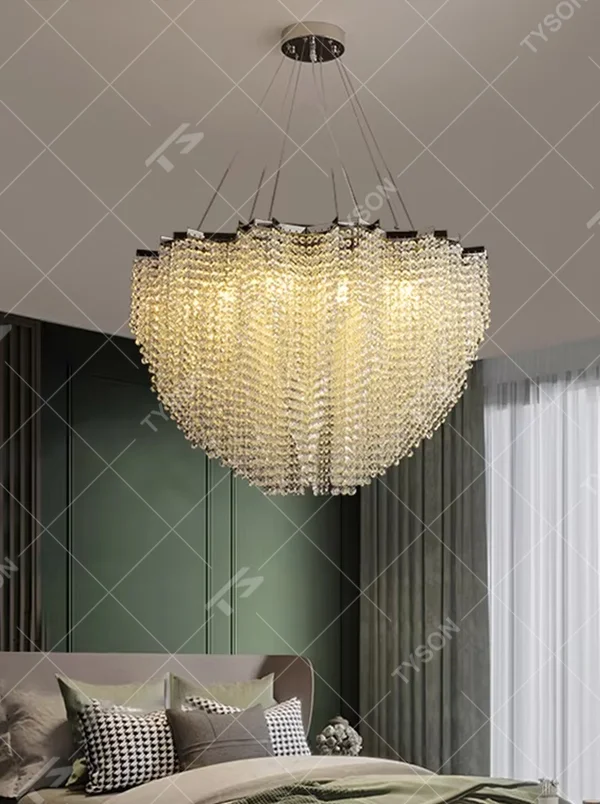 Romantic heart-shaped layered crystal chandelier, crafted with high-density crystal particles to create a full heart shape, paired with a metal top base and adjustable suspension rods, featuring soft and brilliant light, combining decorative and lighting functions, suitable for wedding rooms, bedrooms, high-end restaurants, romantic theme clubs and other spaces.