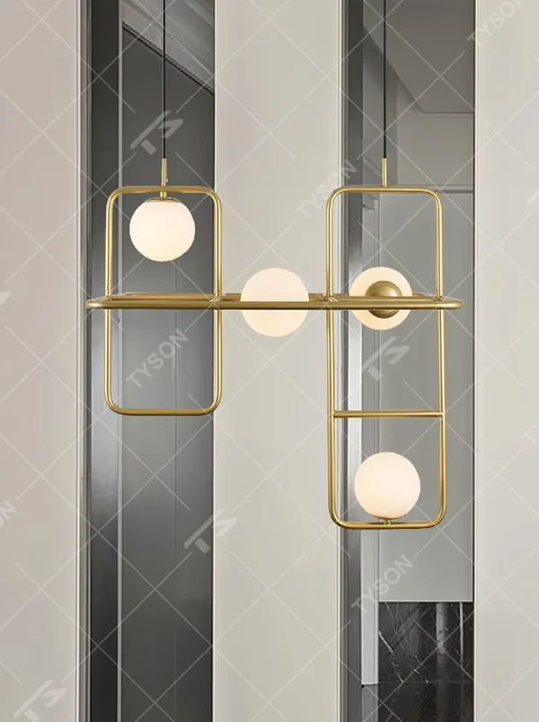 A modern minimalist style geometric line chandelier, featuring an asymmetric frame made of gold metal paired with milky white glowing spheres, combining decorative appeal with practical illumination, ideal for creating a minimalist and sophisticated space atmosphere.