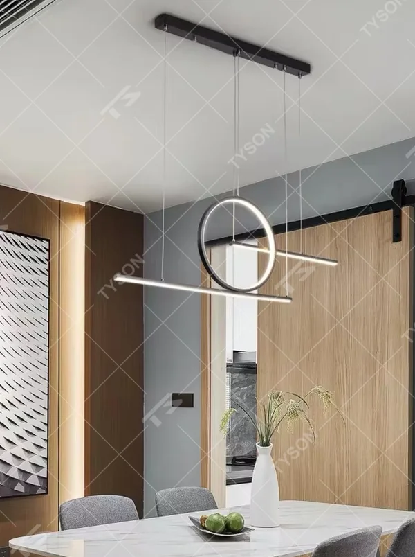 A modern minimalist and new Chinese style geometric linear chandelier, featuring a gold metal frame composed of a circle and two straight lines, with built-in LED strips. It emits a soft and uniform glow when lit, combining decorative appeal with practical illumination, ideal for creating a minimalist and Zen space atmosphere.