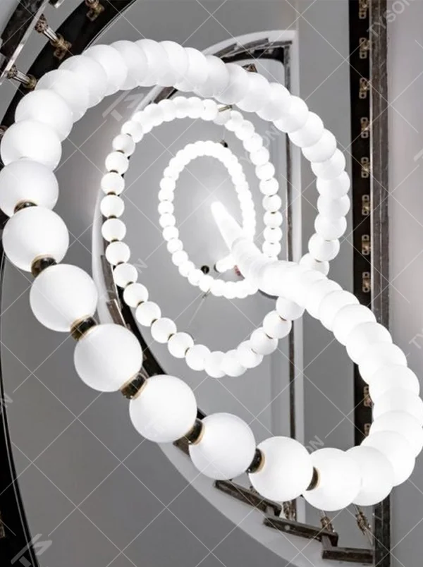 Modern Art Spiral Beaded Chandelier, Composed of Milk White Spherical Lamps Connected in a Spiral Shape Following Staircase Curves, with Gold Metal Details, Serves Both Lighting and Decorative Purposes, Ideal for Villa Spiral Staircases, High-Ceiling Halls, Luxury Hotel Lobbies, etc.
