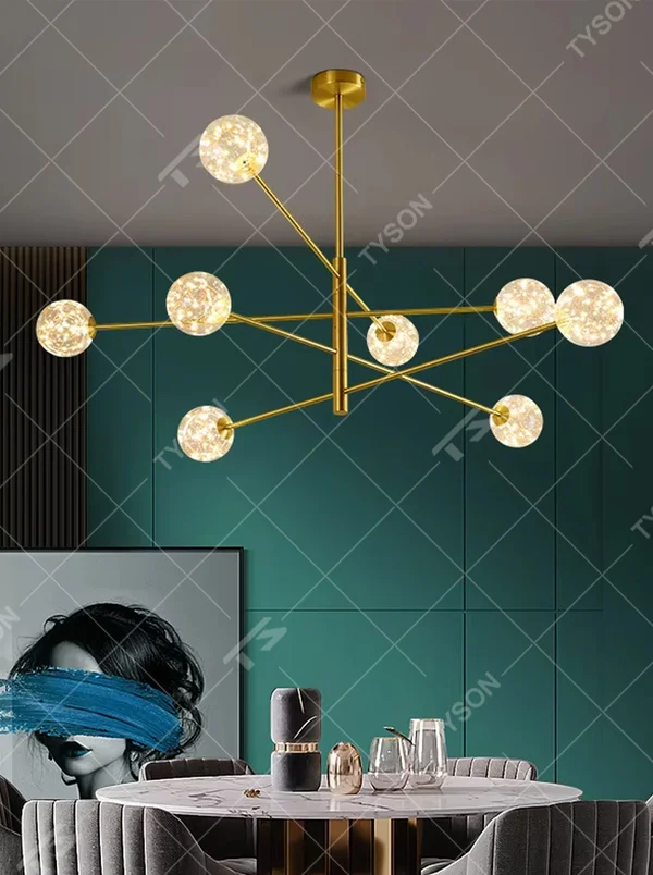 Modern light luxury starry sky molecular ball chandelier, with golden metal branch frame paired with starry sky effect glass ball lampshades, shaped like interstellar molecular clusters, featuring brilliant and soft light, combining decorative and lighting functions, suitable for living rooms, dining rooms, light luxury style spaces.