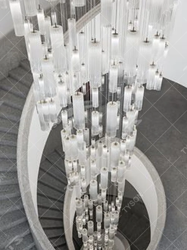 This is a modern minimalist large waterfall-style pendant chandelier, composed of densely hung transparent and translucent crystal tubes, presenting a dynamic flowing water shape, with both decorative and lighting functions, ideal for high-ceiling public spaces such as hotel lobbies and shopping mall atriums.
