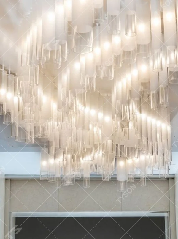 Modern Luxury Multi-layer Rectangular Crystal Chandelier, composed of transparent crystal strips and metal frames in a layered suspended design, serves both lighting and decorative purposes, ideal for hotel elevator lobbies, corridors, high-end office building lobbies and other public spaces.