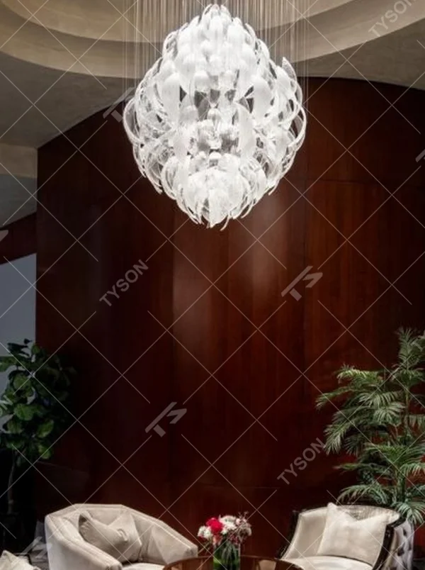 Modern Art Cloud-Shaped Crystal Chandelier, composed of layered irregular transparent crystal/acrylic sheets, serves both lighting and decorative purposes, ideal for luxury hotel lobbies, clubs, sales centers, light luxury living rooms and other high-ceiling spaces.