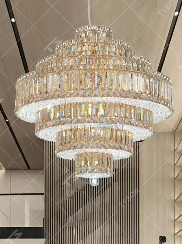 This is a luxurious multi-layer pagoda-shaped crystal chandelier, supported by a gold metal frame with high-transparency crystal strips, creating a brilliant and dazzling light effect through staggered layers, with both decorative and lighting functions, ideal for high-end indoor spaces such as villa living rooms and hotel lobbies.