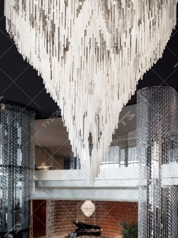 Modern Art Waterdrop Rain Curtain Crystal Chandelier, composed of numerous white transparent crystal/acrylic strips suspended in an irregular waterdrop shape, serves both lighting and decorative purposes, ideal for luxury hotel lobbies, sales centers, high-end clubs, art galleries and other high-ceiling public spaces.